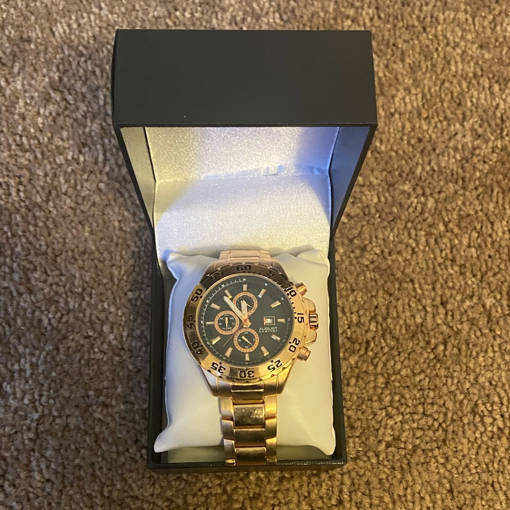 Brand new Gold August Steiner Cross timepiece